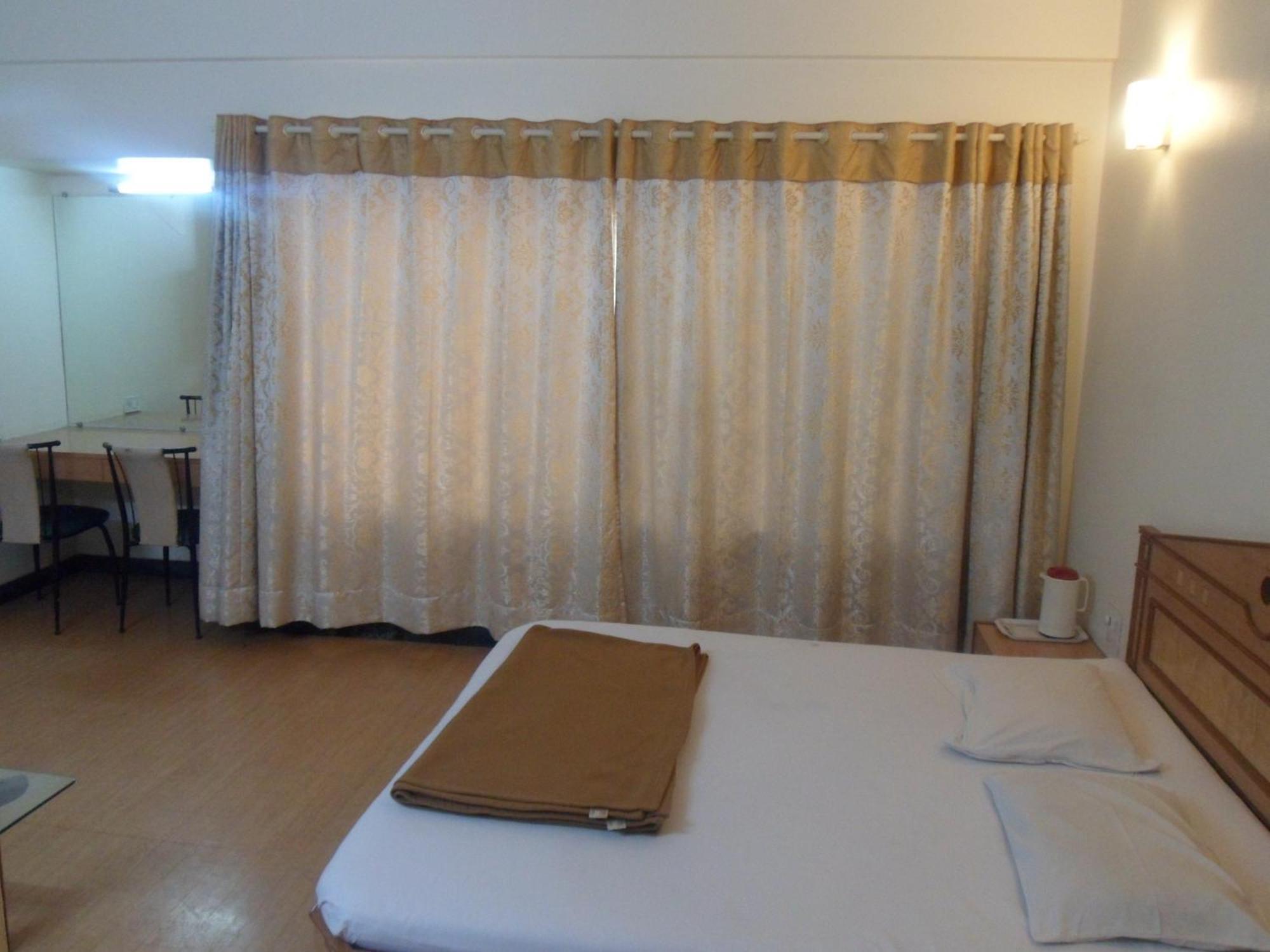 Hotel Pooja International ناسيك الغرفة الصورة