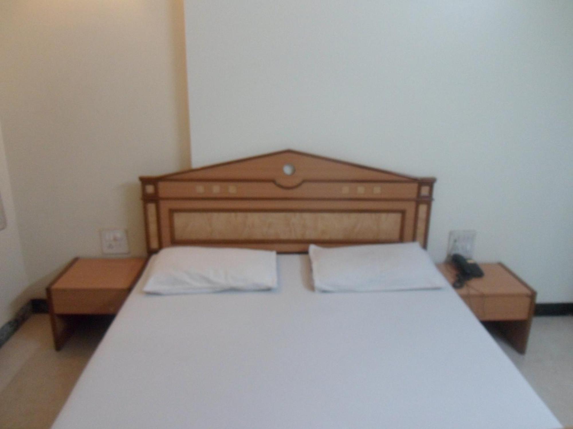 Hotel Pooja International ناسيك الغرفة الصورة